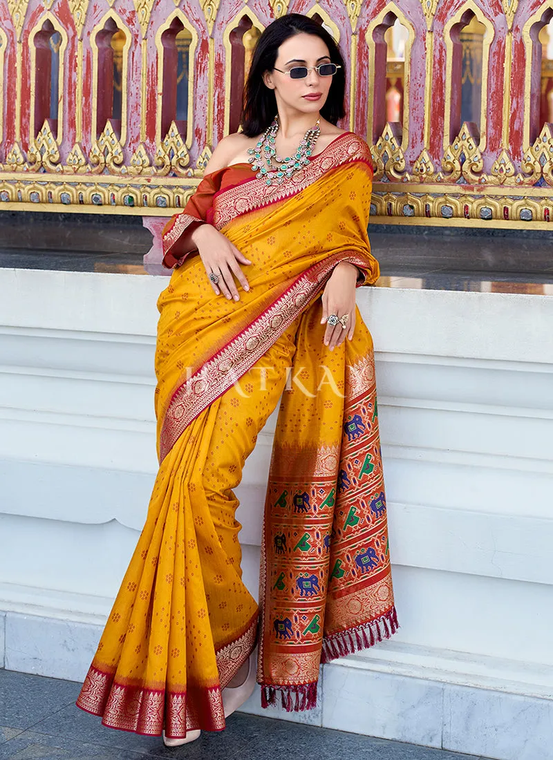Yellow and Orange Ikat Printed Patola Silk Saree