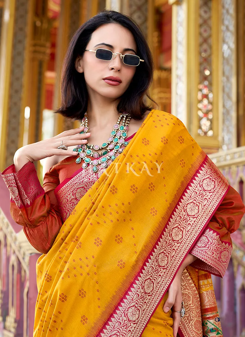 Yellow and Orange Ikat Printed Patola Silk Saree