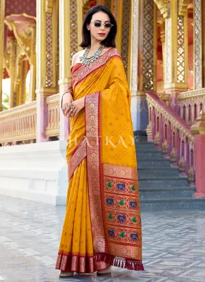 Yellow and Orange Ikat Printed Patola Silk Saree