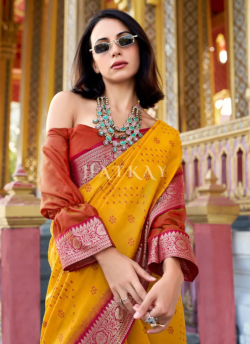Yellow and Orange Ikat Printed Patola Silk Saree
